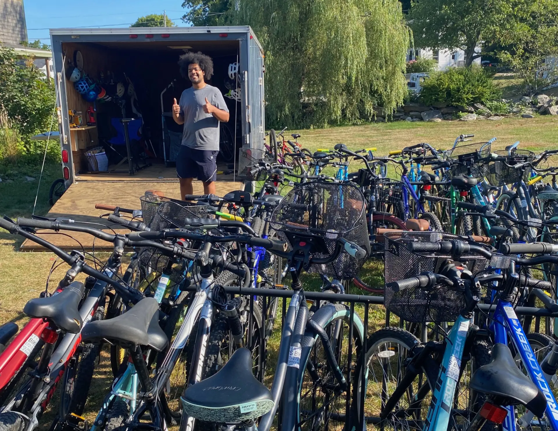 A friendly lineup of Enie's Bikes rental bikes and trailers, Peaks Island