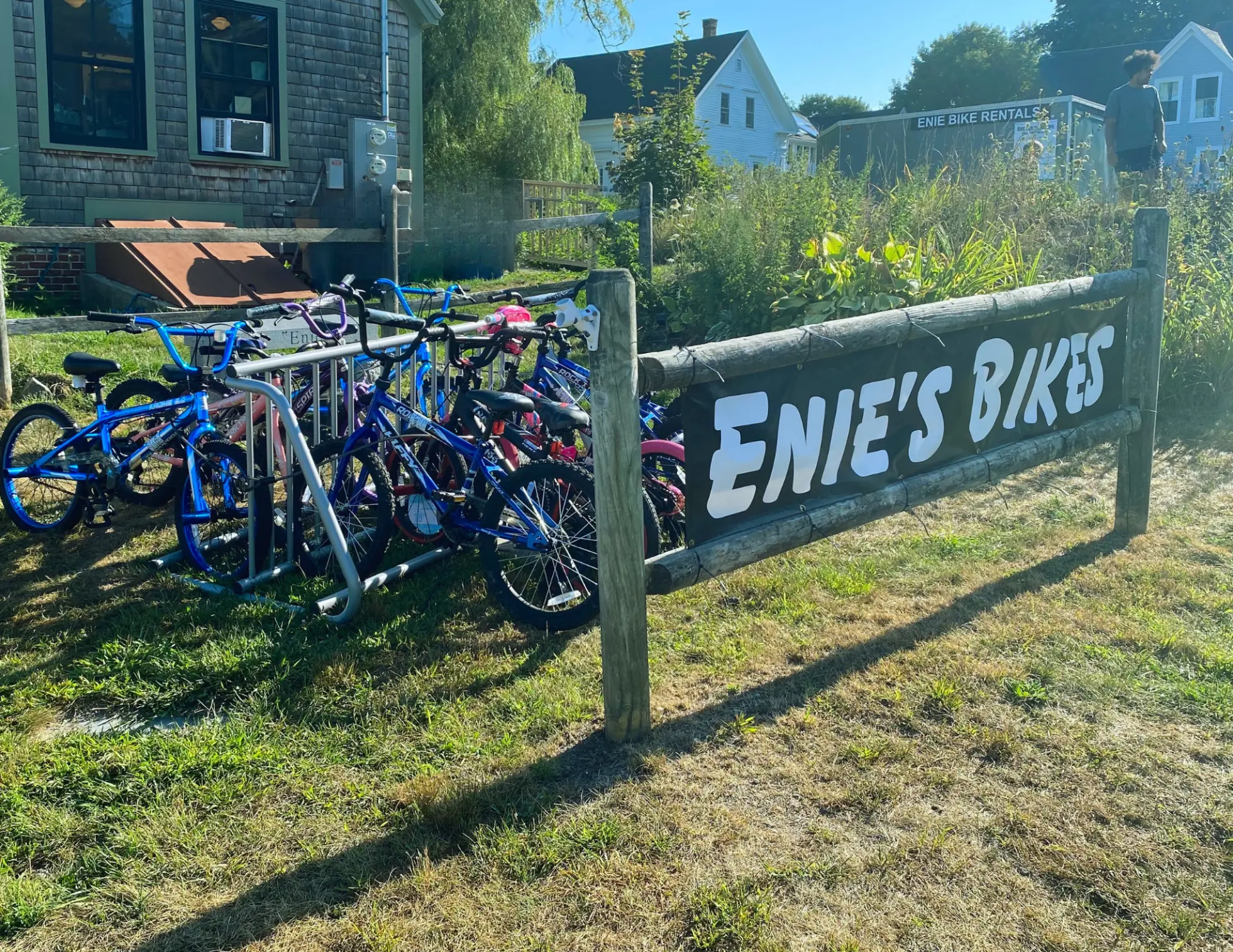 Enie's Bikes storefront sign and bike rack at 14 Epps Street, Peaks Island